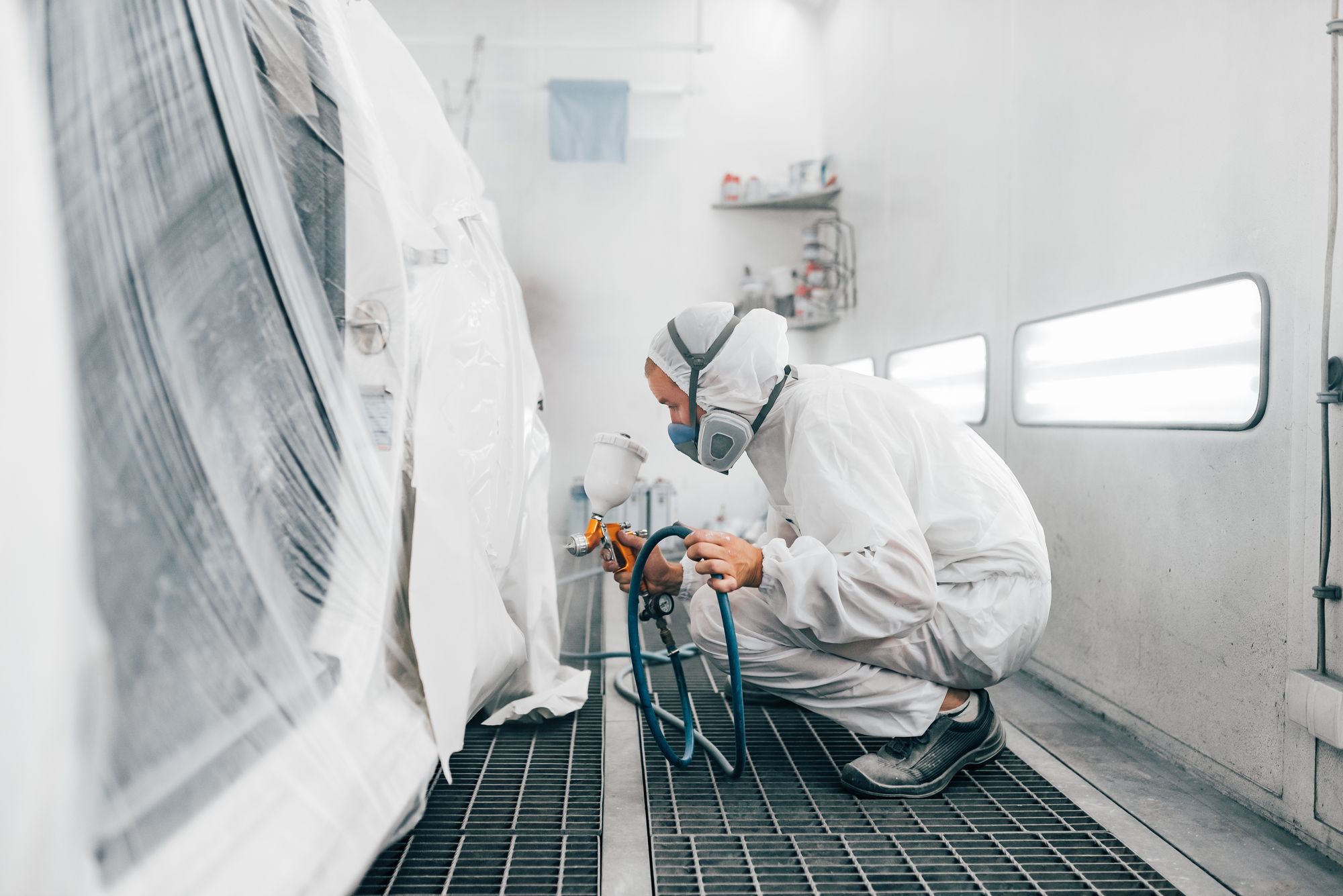 Refinish work in the spray booth at Modern Auto Collision Center